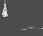 Brennender Kirchturm
                      der Gertrudiskirche am 23. August 1943, ca. 2:30
                      frh