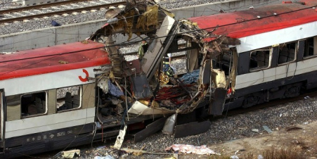 Madrid attacks,
                                destroyed train on 3 November 2004
                                (2004-11-3), 911 days after 11 September
                                "9/11"