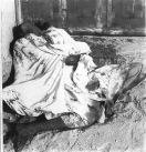 Scorched earth: Dead victims in the
                            villages, covered