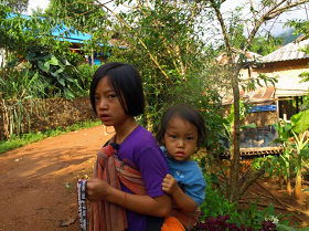 Northern Thailand, sisters in the village of
Akha Northern
Thailand, sisters in the village of Akha