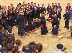Thailand, Khmu festivity
with music and dance in traditional clothes
in the village of Ban Chom Ong Thailand,
Khmu festivity with music and dance in
traditional clothes in the village of Ban
Chom Ong
