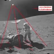 Cos de sombras alrededor del
                                "carro lunar" de Apolo 16, y
                                hay dos soles en el cielo lunar...