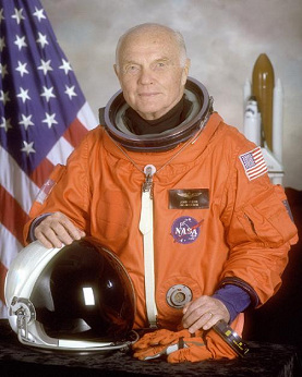 John Glenn as a senator in an astronaut
                            suit.