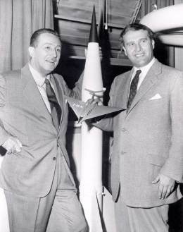 1955: Walt Disney (left) and
Wernher von Braun (right) with a model of
Hitler's V2 rocket, Braun with an airplane
model in his hand. 1955: Walt Disney (left) and Wernher von
Braun (right) with a model of Hitler's V2
rocket, Braun with an airplane model in his
hand.