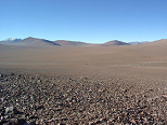 Atacama desert, plains with chain of
                            hills