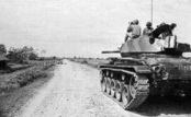 Battle of Ap Bac 1963: Guard with
                                tank.