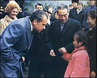 Nixon speaking to a Chinese girl,
                              Hangchow, 26 February 1972. He spoke
                              Chinese with the girl?
