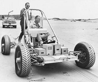 Gerald Carr (left) and
Joe Engle (seating) testing a 1:1 model of a
"moon car", 22. December.1969 Gerald Carr (left) and Joe Engle (seating)
testing a 1:1 model of a "moon car",
22. December.1969