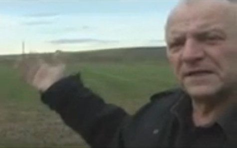 An eye witness showing a field where
                              1,000s of German prisoners of war are
                              buried, he says (26min. 22sec.)