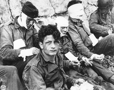 6.6.1944 Strand Omaha
                            Nachmittag, verwundete
                            "US"-Soldaten