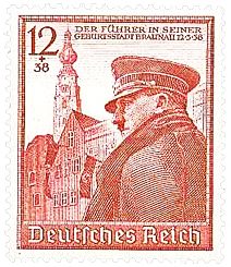 Hitler at Braunau during the
                            annexation of Austria, stamp of 1939. Hitler
                            visited the grave of his parents there. Of
                            course, this was another propaganda
                            instrument...
