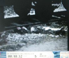 KZ Dachau bei
                          Kriegsende 02: Hftling am Boden liegend 01