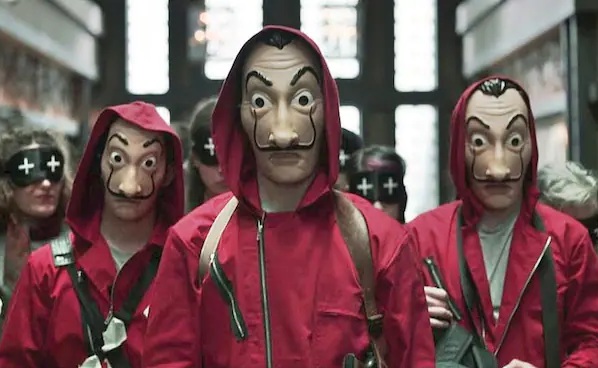 Photo text 11: MASKS FOR BANK ROBBERS WITH NOSE
OPENINGS: "House of Money" with Pedro Alonso:
Bank robbers disguise themselves with masks showing Dalí's
face. Photo text 11: MASKS FOR BANK ROBBERS WITH
NOSE OPENINGS: "House of Money" with Pedro
Alonso: Bank robbers disguise themselves with masks
showing Dalí's face.