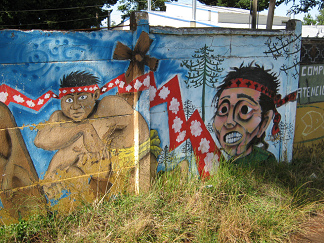 Temuco Cholchol, pintura de un muro de
                  Mapuches