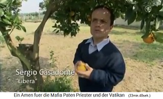 Sergio Casadonte of
                    "Libera" - with an orange tree