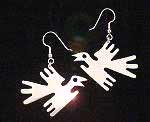 Quetzal birds as
                          earrings