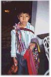 Maya natives in Guatemala: boy
selling articrafts in the street Maya natives in Guatemala:
boy selling articrafts in the street