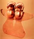 Unrolled Quimbaya finger ring with two
                            heads of birds