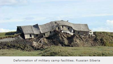 Defrozen permafrost
ground: deformed house in Siberia Defrozen permafrost ground: deformed
house in Siberia